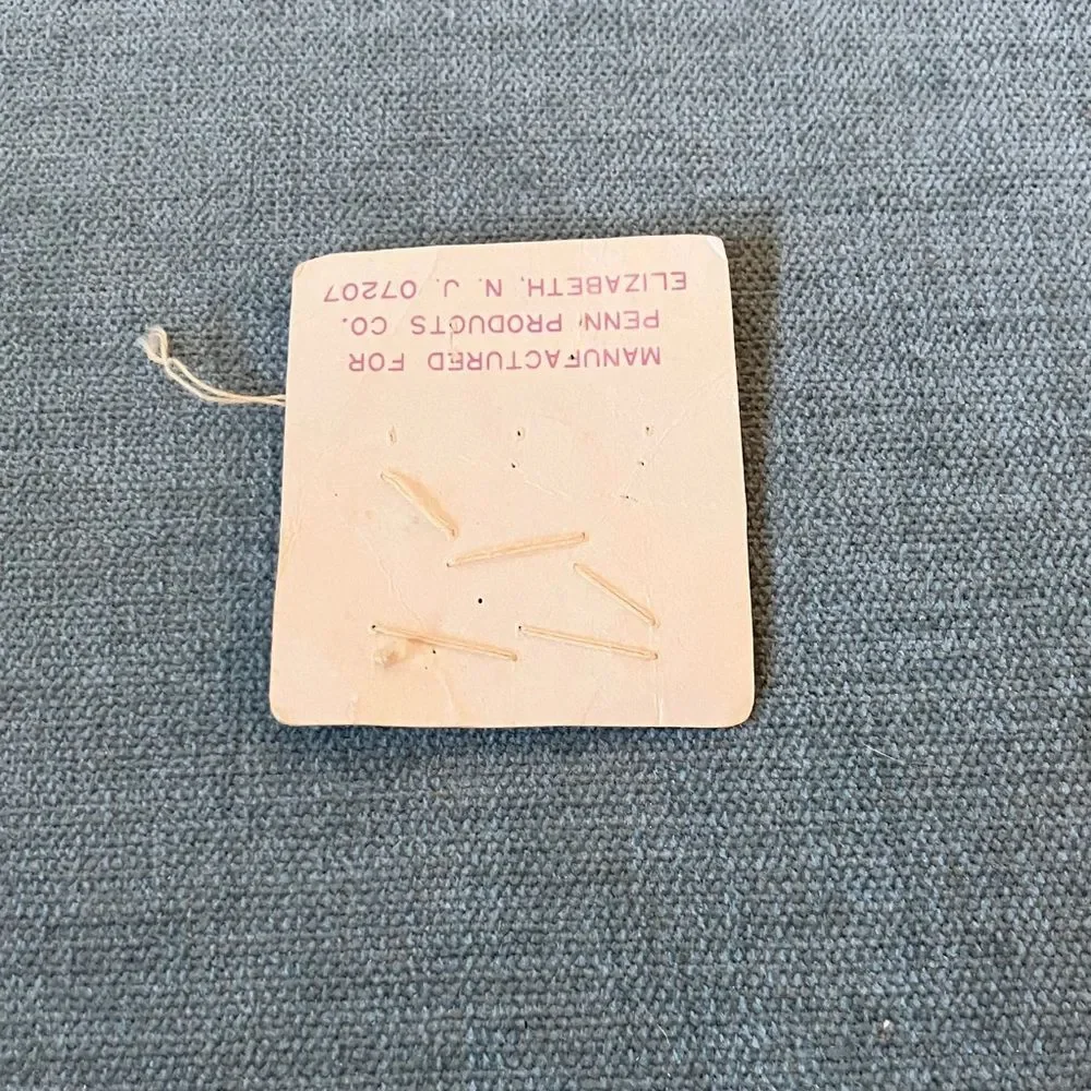 Partially Used Package of Buttons